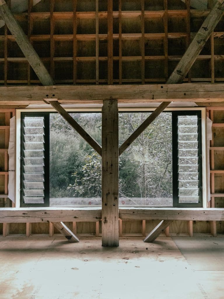 Luxury heritage barn home restoration with modern amenities, preserving historical charm and craftsmanship NZ
