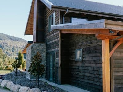 Luxury countryside barn home with traditional timber frame and river views