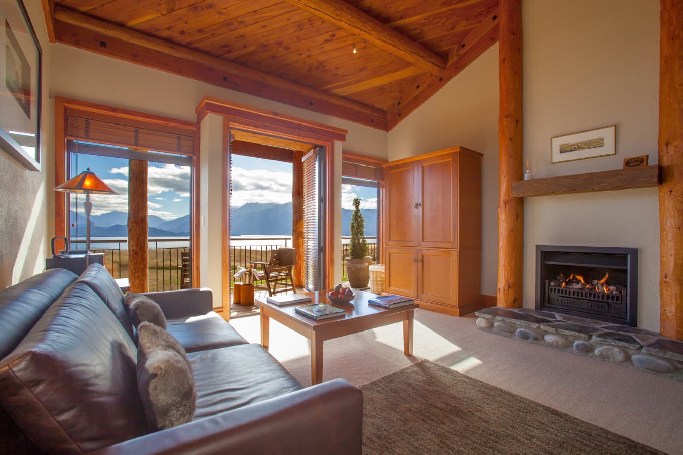 Panoramic lodge views framed by Douglas-fir timber construction 