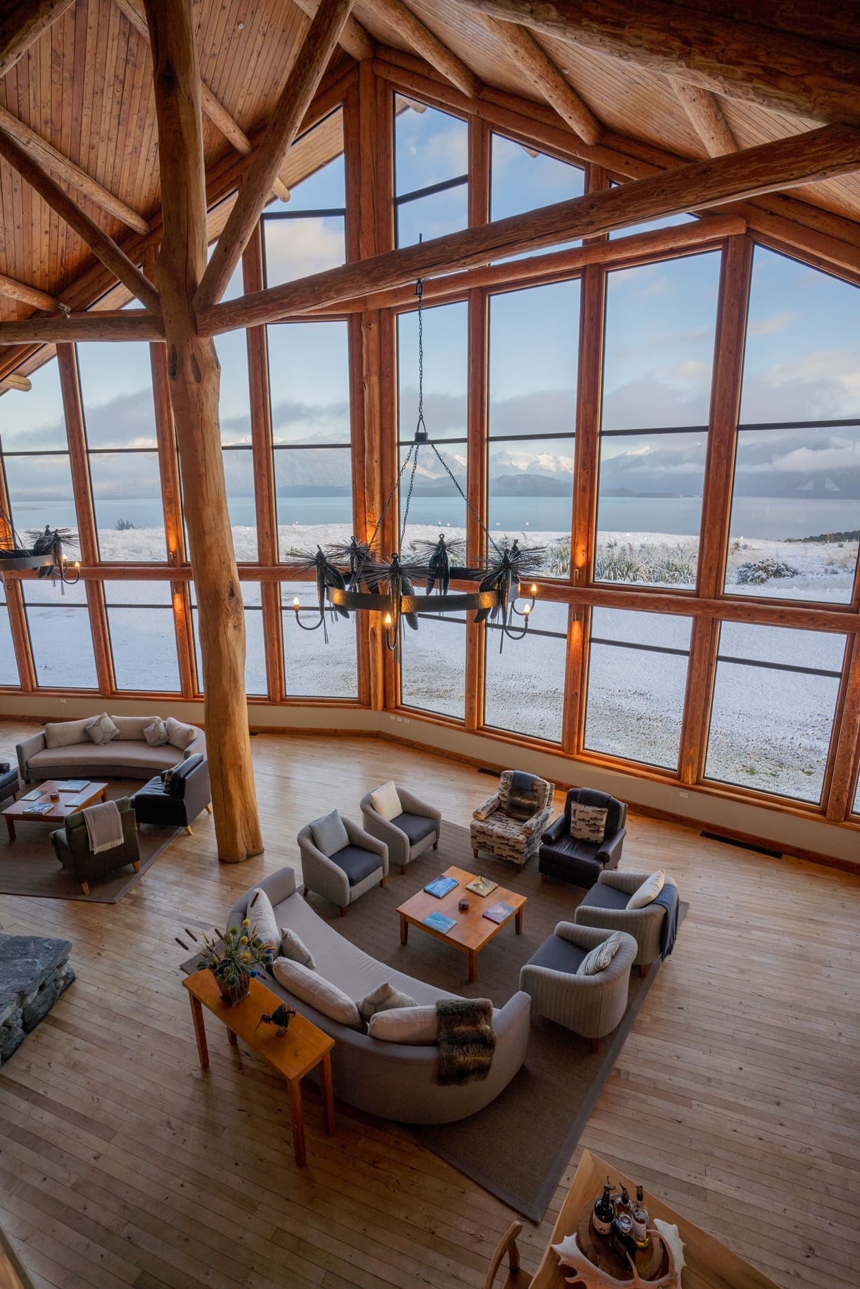 Fiordland Lodge great room featuring exposed Douglas-fir beams and natural finishes