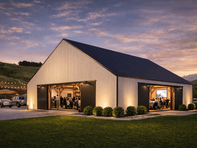 Luxury barn style event venue in New Zealand built with Macrocarpa timber for modern barn living events