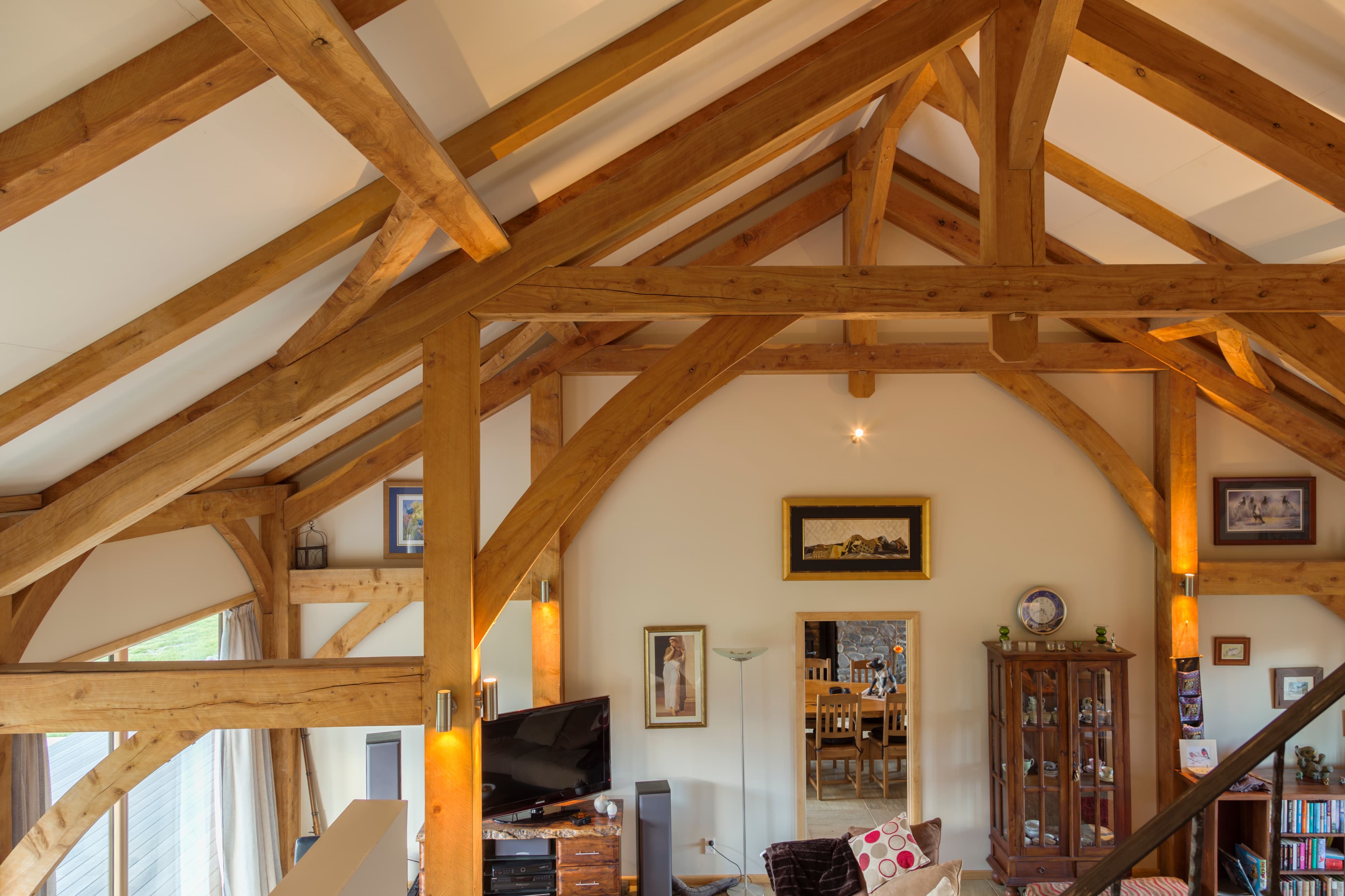 Mountain lodge design with exposed mortise and tenon timber frame construction