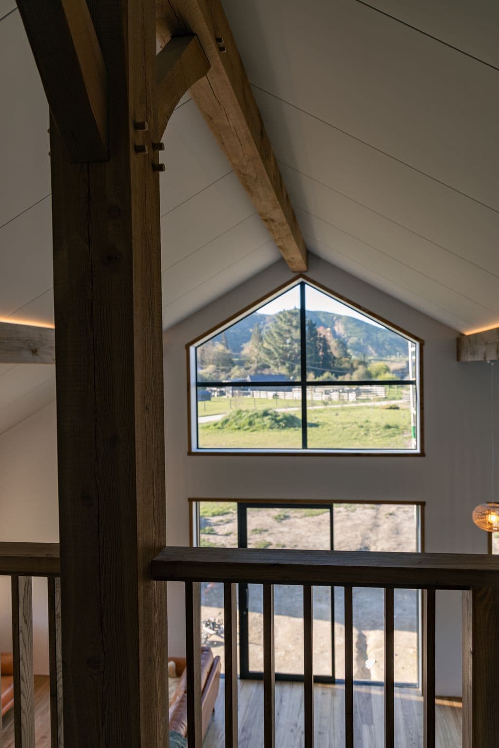 Mezzanine loft view from the first floor of the hybrid FirstFrame barn home which is around $3,500/m2 so is a very affordable and spacious high spec home