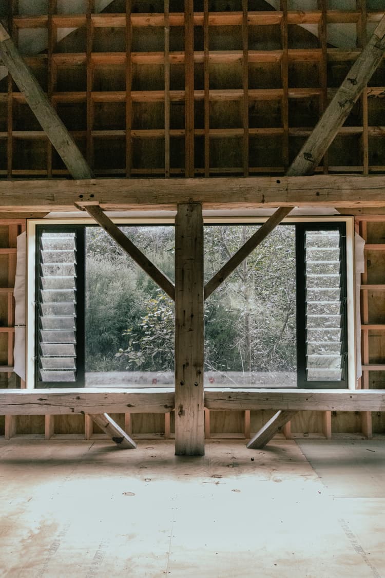 Luxury heritage barn home restoration with modern amenities, preserving historical charm and craftsmanship NZ