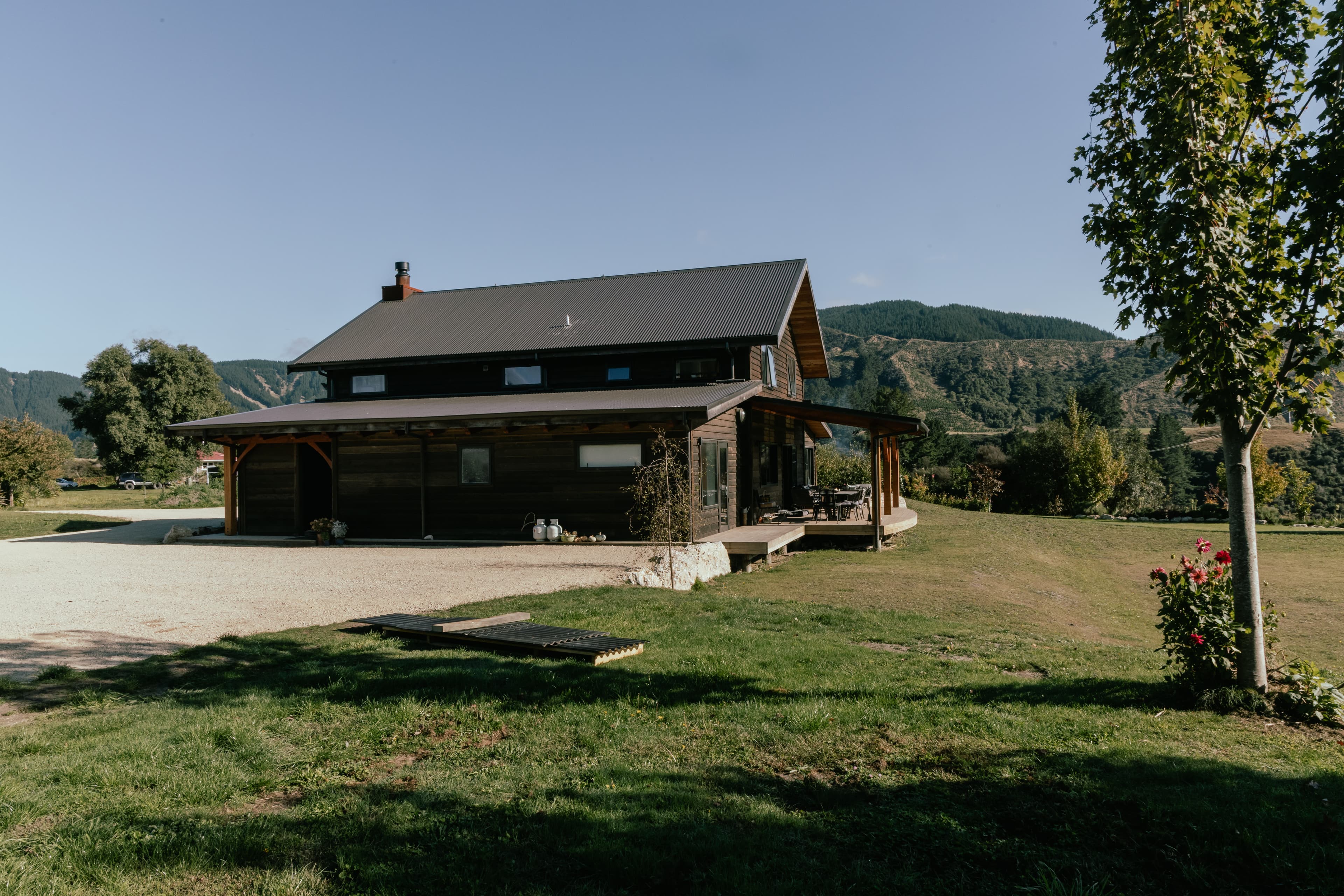 Grand mortise and tenon timber frame barn home overlooking river views