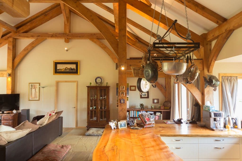 Premium timber frame home with warm minimalist interior styling Hanmer alpine lodge kitchen