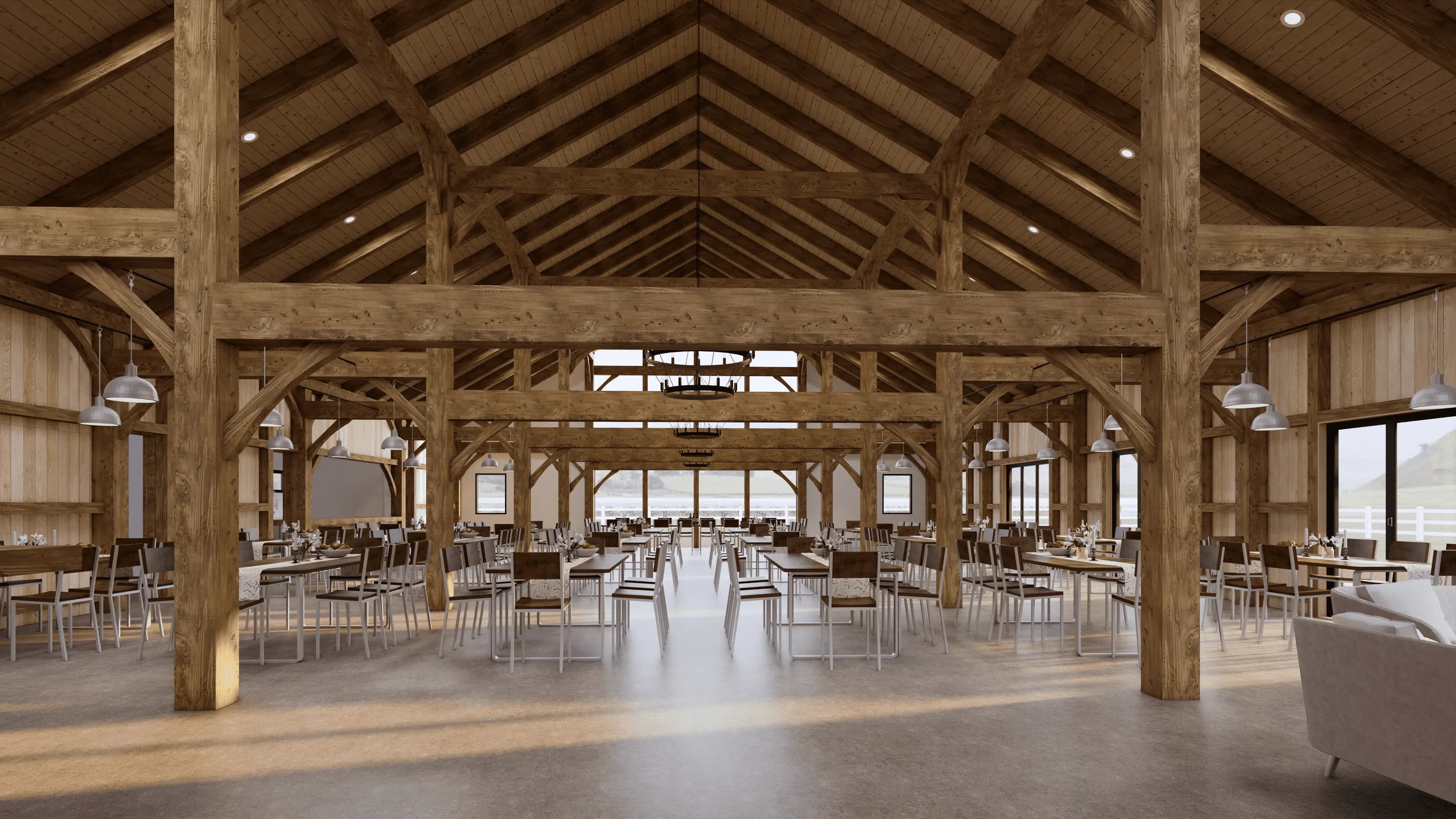 High-end venue barn interior in NZ with dramatic timber trusses and spacious entertaining area